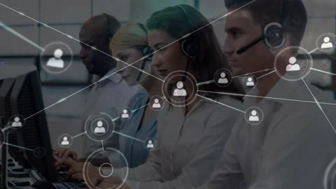 This customer service agent is using headsat to provide assistance to a customer Stock Footage 315638492