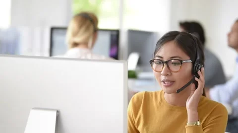 Customer service assistant working in office Stock Footage 68201056