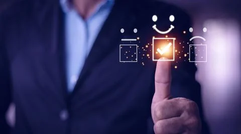 Customer service evaluation concept. smiling Asian male Is using a smartpho.. Stock Photos