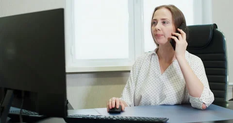 Customer service operator talking on the phone with a customer. Stock Footage 167965636