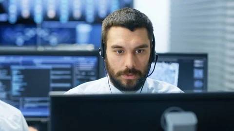 Customer Service Representative Answer Client's Questions in a Headset. Stock Footage 81268605