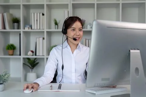Customer Service Representative Assisting Clients via Computer. Call Center Stock Photos