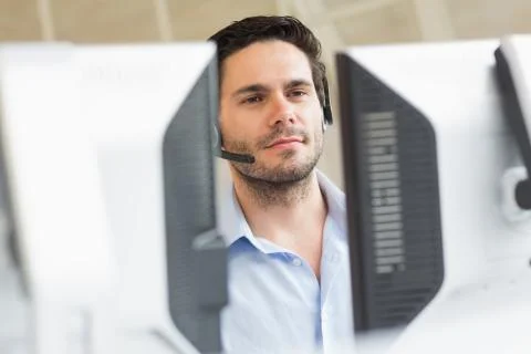 Customer service representative using computer 스톡 사진