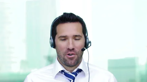 Customer service representative wearing a headset at the office Stock Footage 67535020