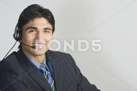 Customer service representative wearing a headset Stock Photos