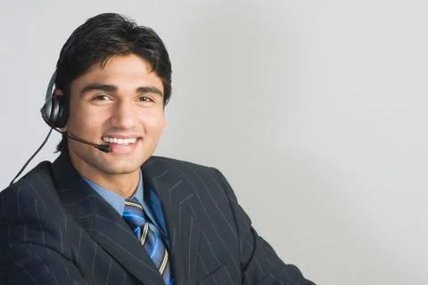 Customer service representative wearing a headset Stock Photos