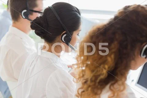 Customer service representatives in office Stock Photos
