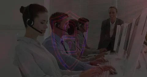 Customer service team using computers with digital security interface overlay Stock Photos