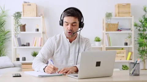 Customer service worker talking on headset. Stock Footage 264789064