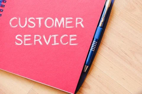 Customer service write on notebook Foto stock