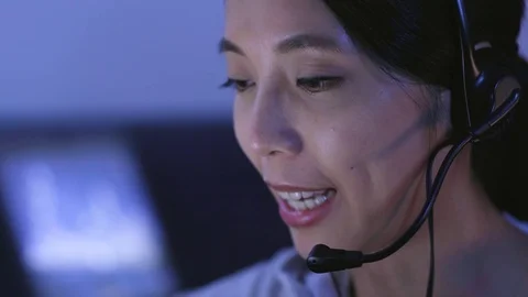 Customer services operator working at night Stock Footage 81188271