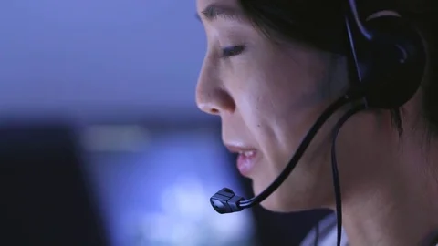 Customer services representative working at night Stock Footage 81154892