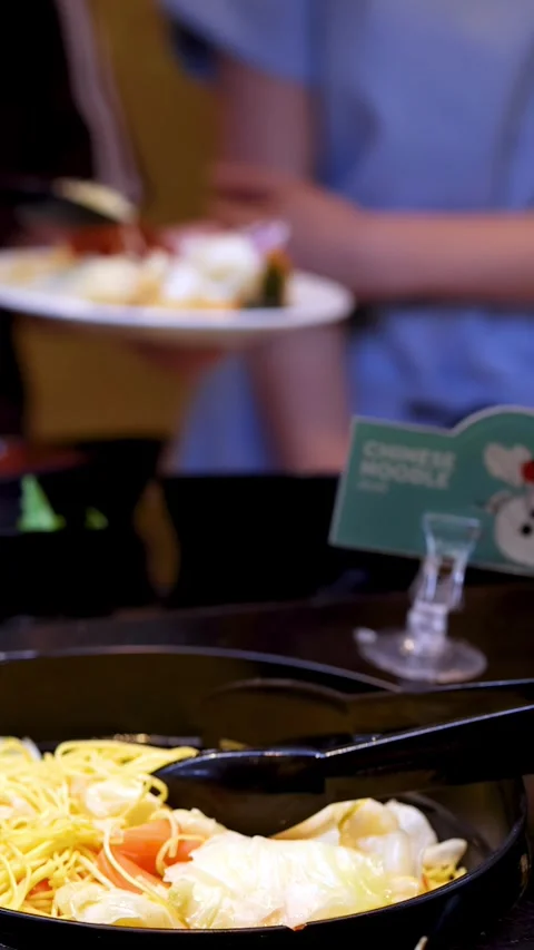 Customer Serving Fresh Noodles at Self-Service Salad Bar Buffet Stock Footage 326708206