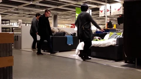 Customer shopping sofa bed inside Ikea store Stock Footage 49681633