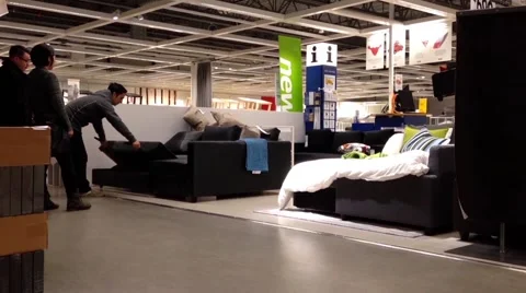 Customer shopping sofa bed inside Ikea store Stock Footage 49681785