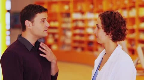 Customer with sore throat in pharmacy Video stock 8880096