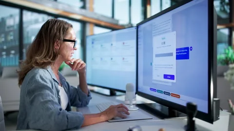 Customer Support Agent Carefully Uses Chatbot Software Stock Footage 347287952