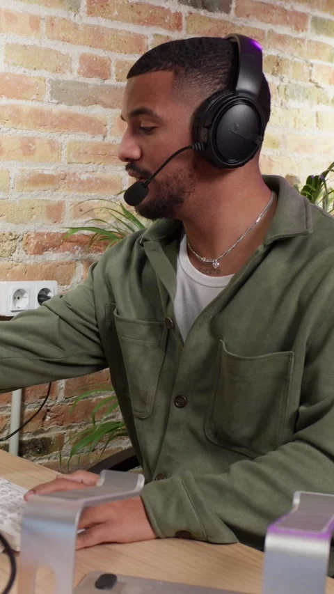 Customer support agent engaging in remote work on call Stock Footage 309364476