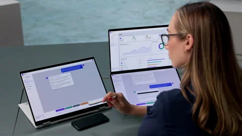 Customer Support Agent Uses AI Chatbot Software On Laptop Stock Footage 339172233