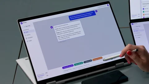 Customer Support Agent Uses AI Chatbot Software On Laptop Stock Footage 339173568