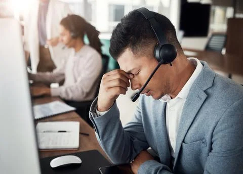 Customer support consulting, burnout headache and man telemarketing on contact Stock Photos