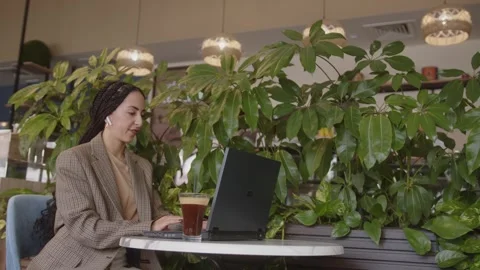 Customer support employee working remotely and having chat with client Video stock 244602165