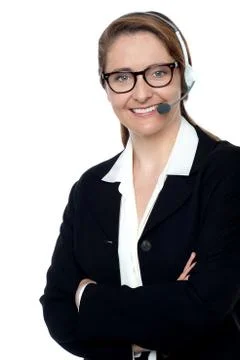 Customer support executive posing confidently Stock Photos
