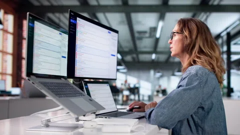 Customer Support Specialist Efficiently Managing Help Desk Tickets Stock Footage 337227136