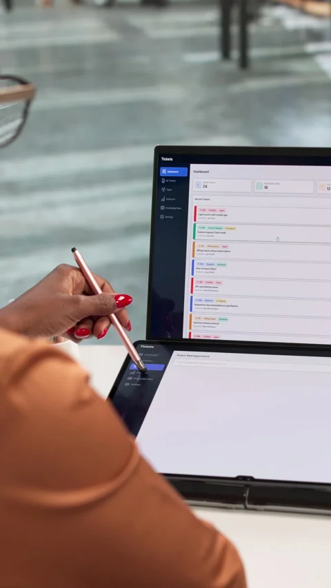 Customer Support Specialist Efficiently Managing Helpdesk Tickets Stock Footage 337228741