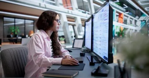 Customer Support Specialist Efficiently Tracking Help Desk Tickets On Compute Stock Photos