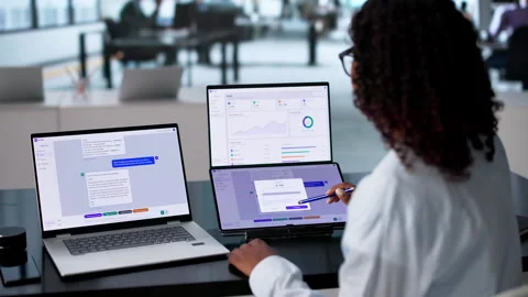 Customer Support Specialist Uses AI Chatbot Stock Footage 341011396