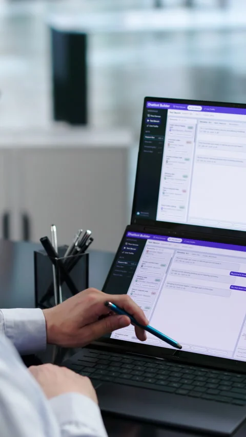 Customer Support Specialist Using AI Chatbot Software Stock Footage 347897992