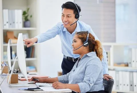 Customer support, training and manager with woman on computer for help, advice Stock Photos