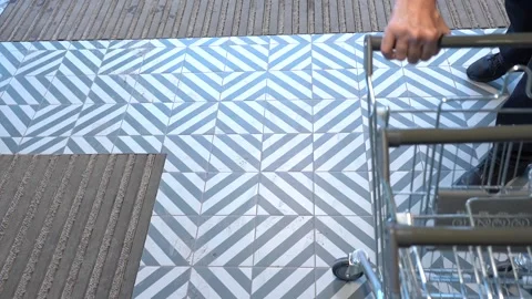 The customer takes a trolley from the row Stock Footage 152690648