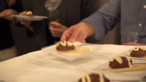 Customer taking a Beef Tartare at an Event Stock Footage 75737697