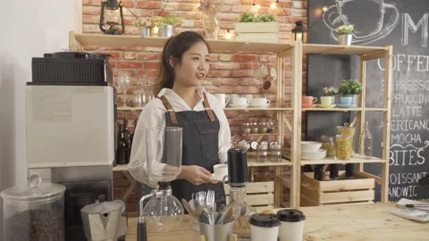 Customer taking coffee from barista in counter Video stock 134112892