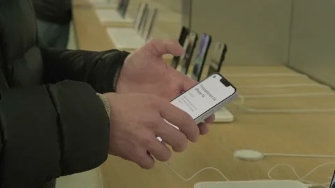 Customer testing new iPhone in apple sales office in Germany, products and .. Stock Footage 224898467