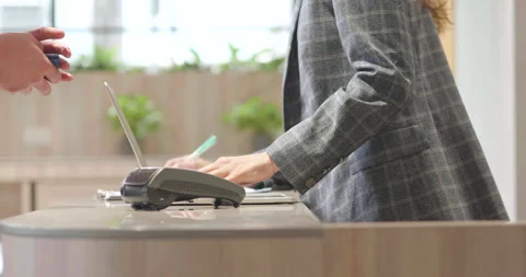 Customer use credit card scanner machine at cashier and confirm button to pay Video stock 150613695