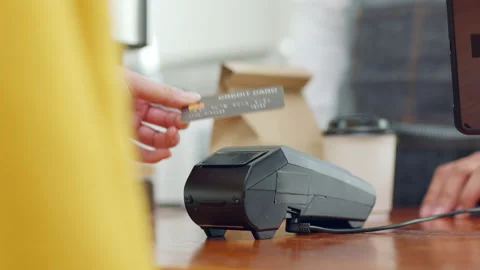 Customer using credit card for payment to owner at cafe restaurant, cashless Stock Footage 196902699