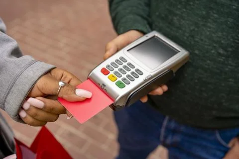 Customer using credit card for payment Stock Photos