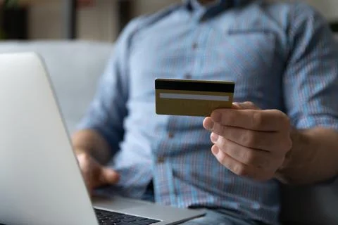 Customer using laptop and credit card for online shopping Stock Photos