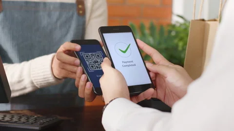 Customer using phone for payment at cafe restaurant, cashless technology Stock Footage 147141795
