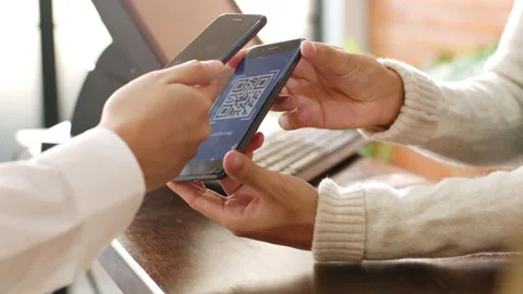 Customer using phone for payment at cafe restaurant, cashless technology Stock Footage 147149987