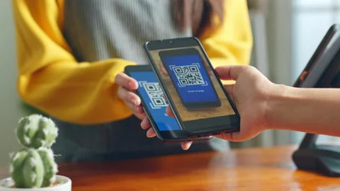 Customer using phone for payment at cafe restaurant, cashless QR code Stock Footage 196901273
