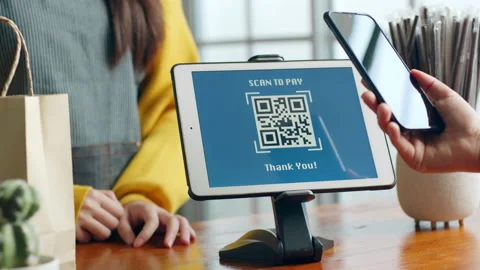 Customer using phone for payment at cafe restaurant, cashless QR code Stock Footage 196901279