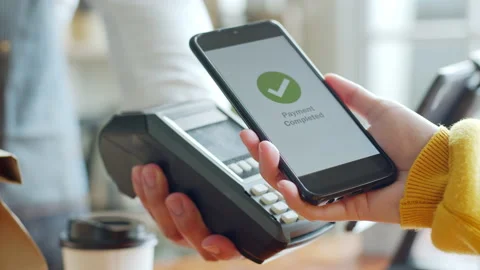 Customer using smartphone for NFC payment at cafe restaurant, cashless Stock Footage 196902466