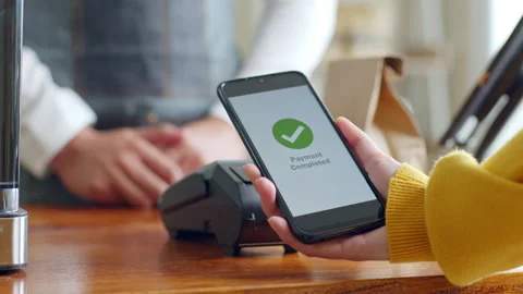 Customer using smartphone for NFC payment at cafe restaurant, cashless Stock Footage 196902668