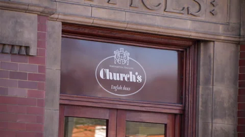 Customer Walks through Entrance to Old Fashioned Shop Front Stock Footage 61637745