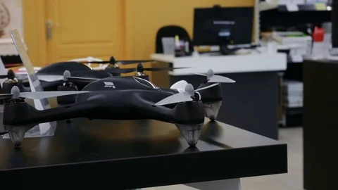 Customer watch quadcopter drone in electronic Store Stock Footage 78185107