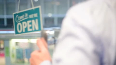 Customer wearing protective face mask and visor entering shop united kingdom Stock Footage 141468489